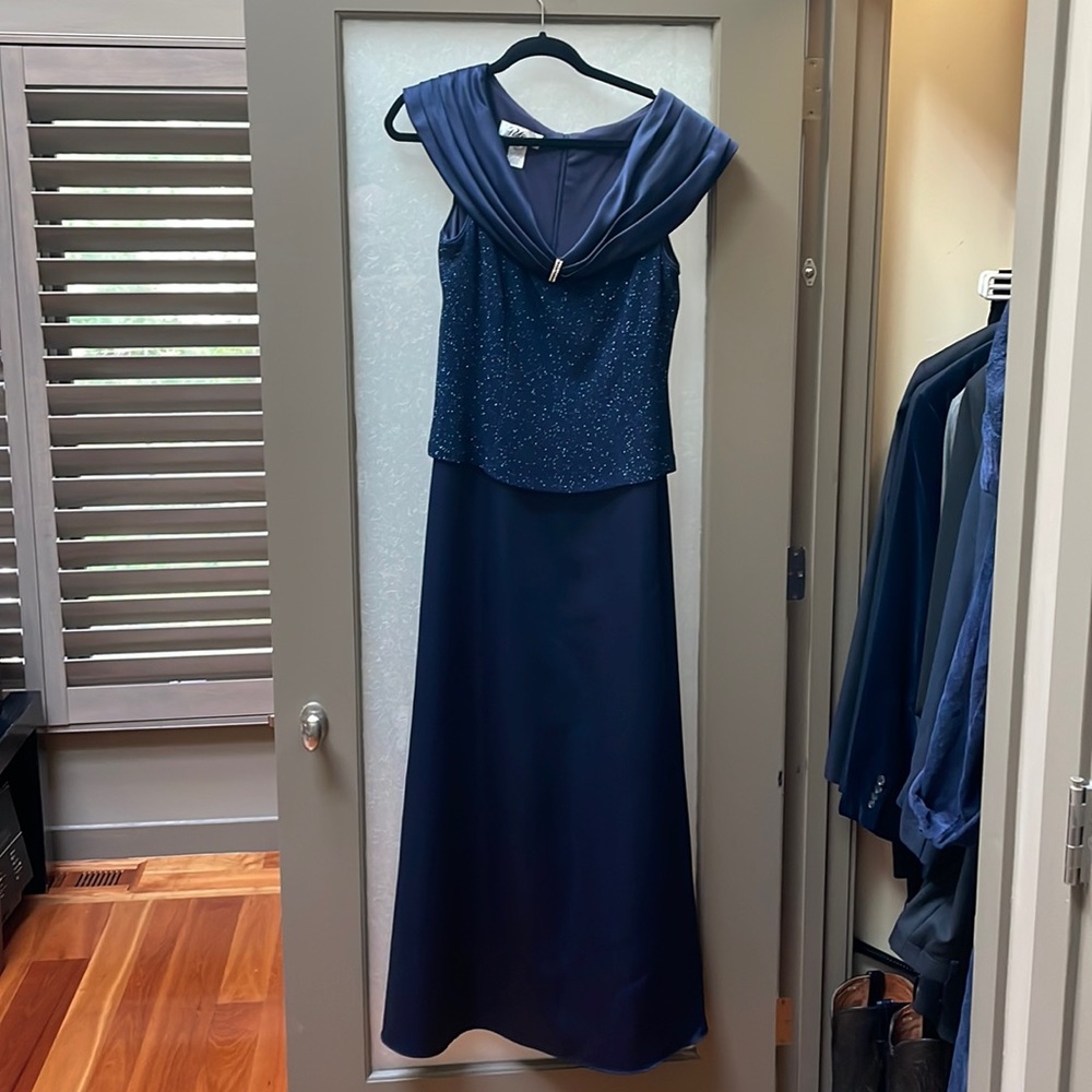 Patra size 14 breathtaking gown. Bedazzled and classy. Worn once.
